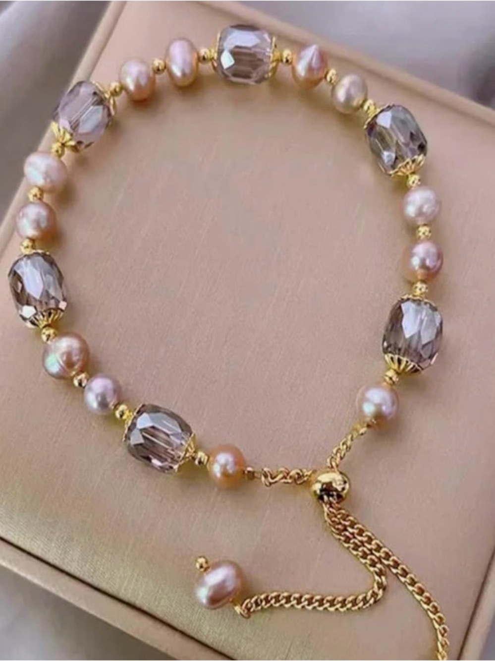 Gold Pearl Bracelet with Smoky Crystal Accents.